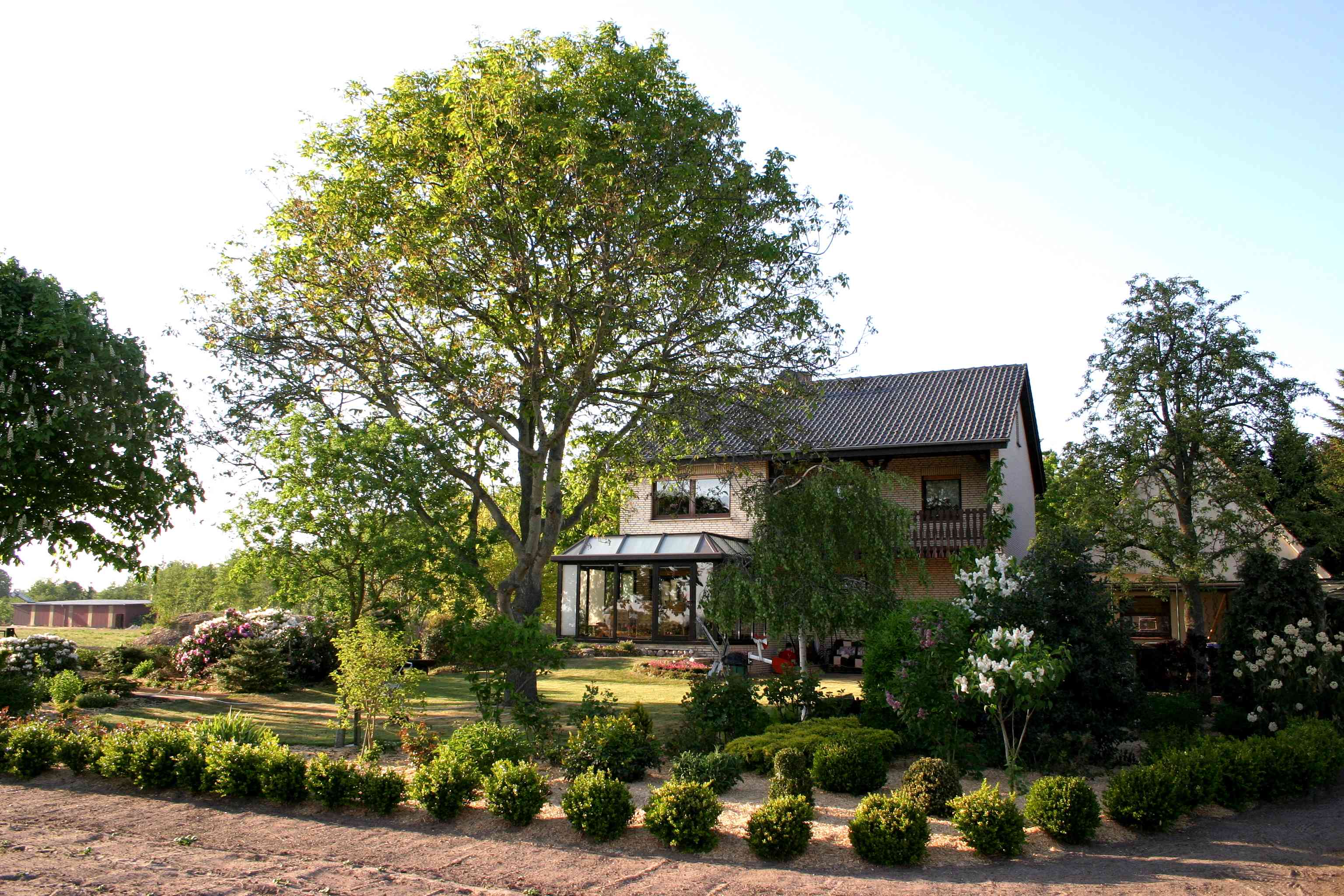 House with beautiful yard and garden