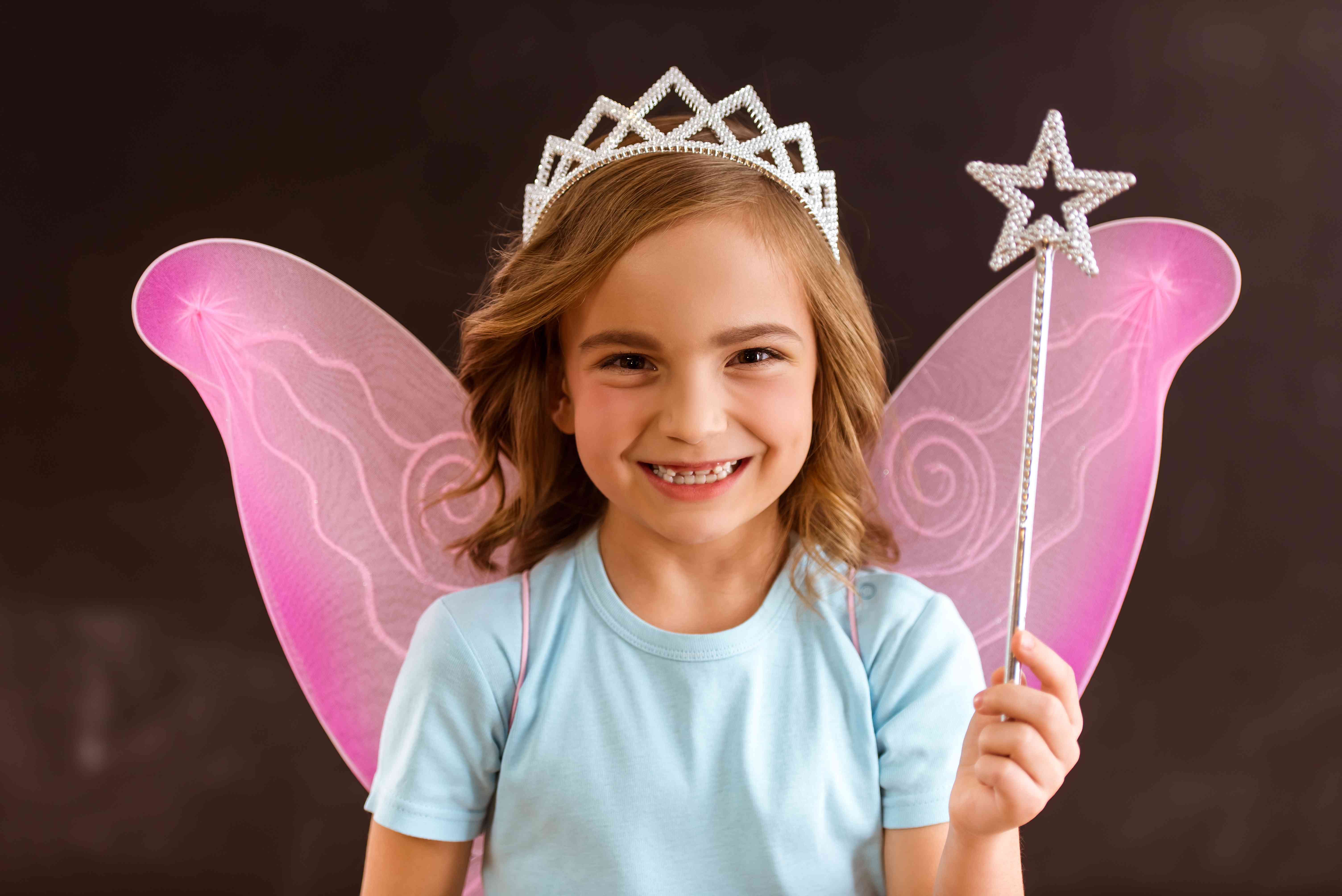 A Young Girl Wearing a Fairy Costume