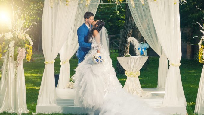 Couple after their garden wedding ceremony