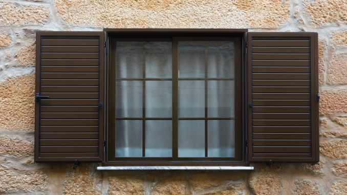 Outside view of a window with curtains