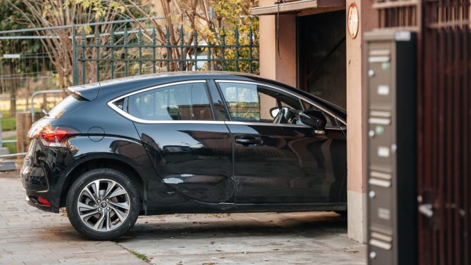 Car about to park in a carport