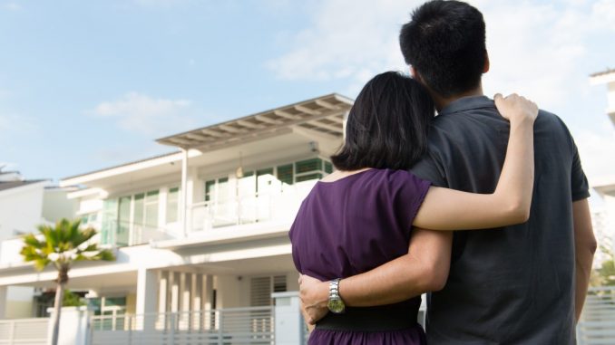 Couple looking at new house