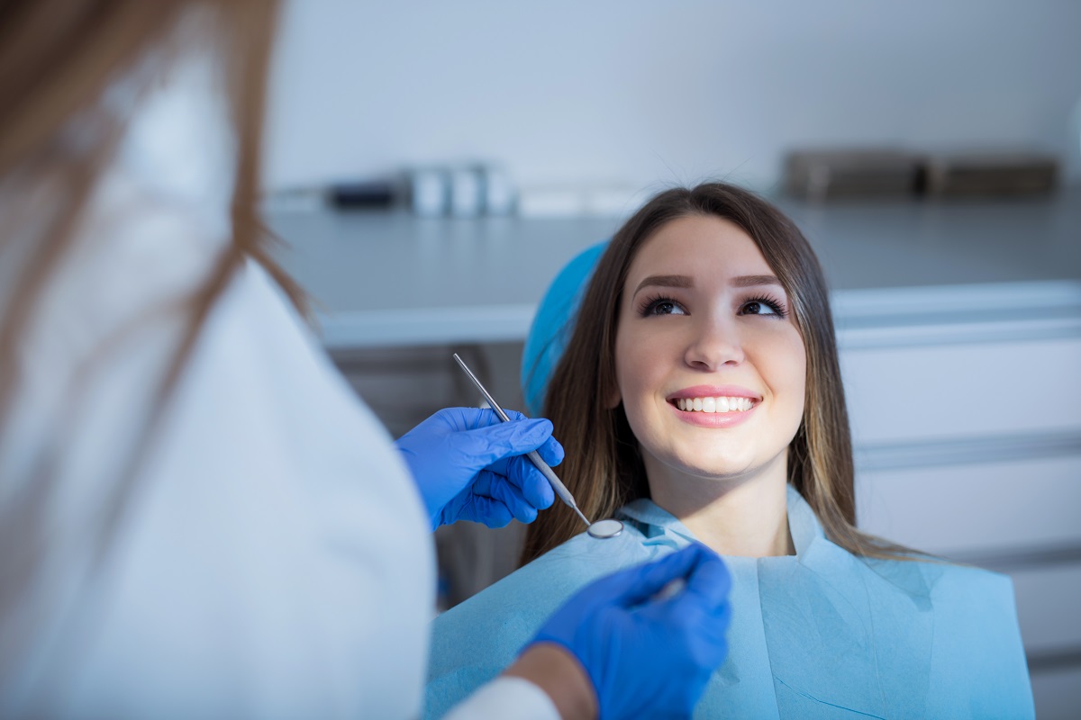 a cosmetic dentist at work