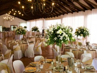 Wedding venue with bouquet as centerpieces