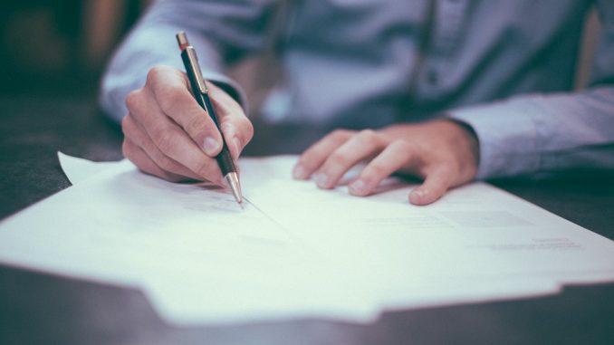 Man writing letter