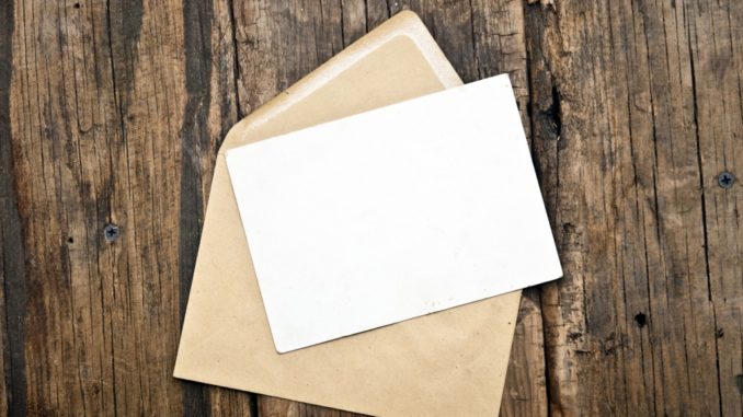 a blank envelope and card
