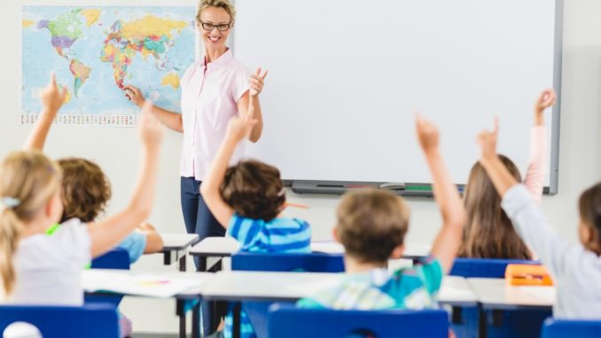 teacher and stuent in a classroom