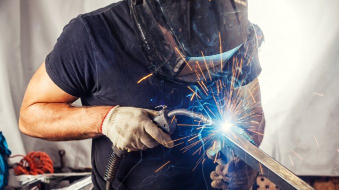 Man welding a metal