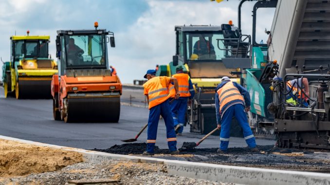 men asphalt paving