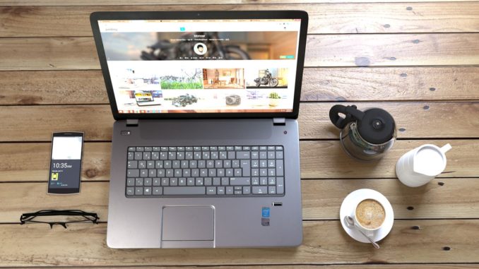 Laptop on wood table