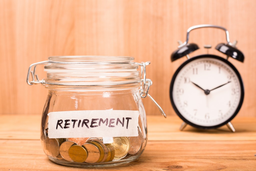 retirement jar filled with coins