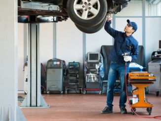 mechanic fixing the car