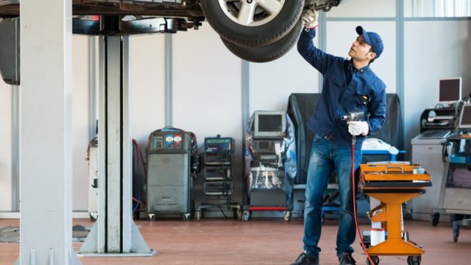 mechanic fixing the car