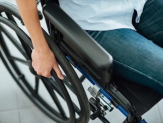 person with disability in a wheel chair