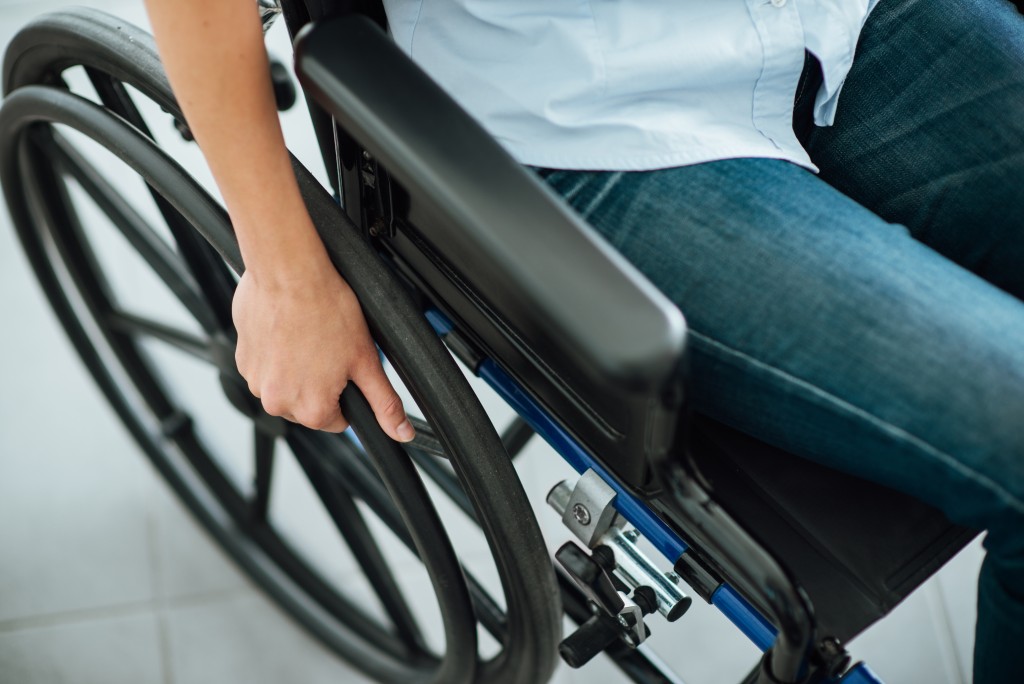 person with disability in a wheel chair