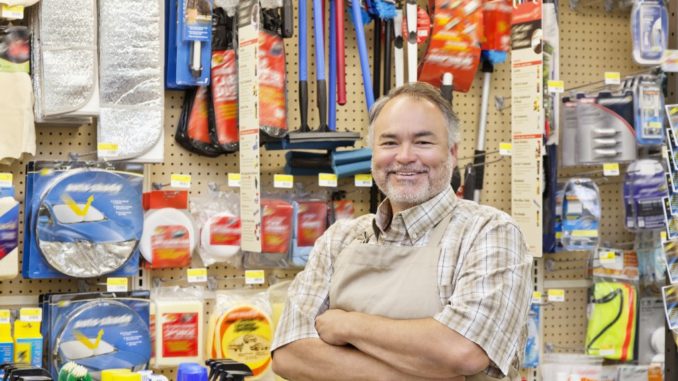 man posed in a hardware store