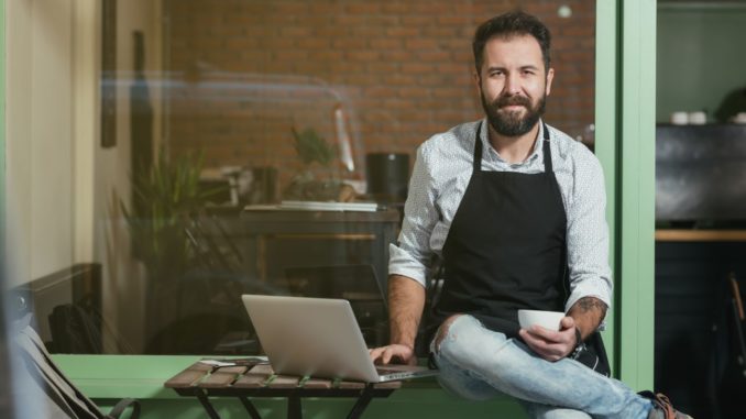 Business owner having coffee