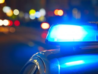 Police car on the street at night