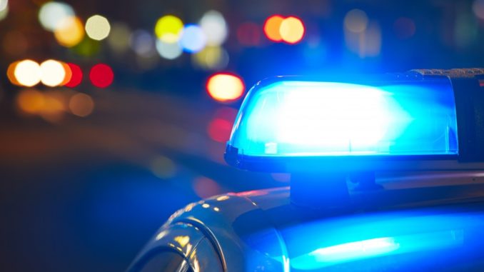 Police car on the street at night