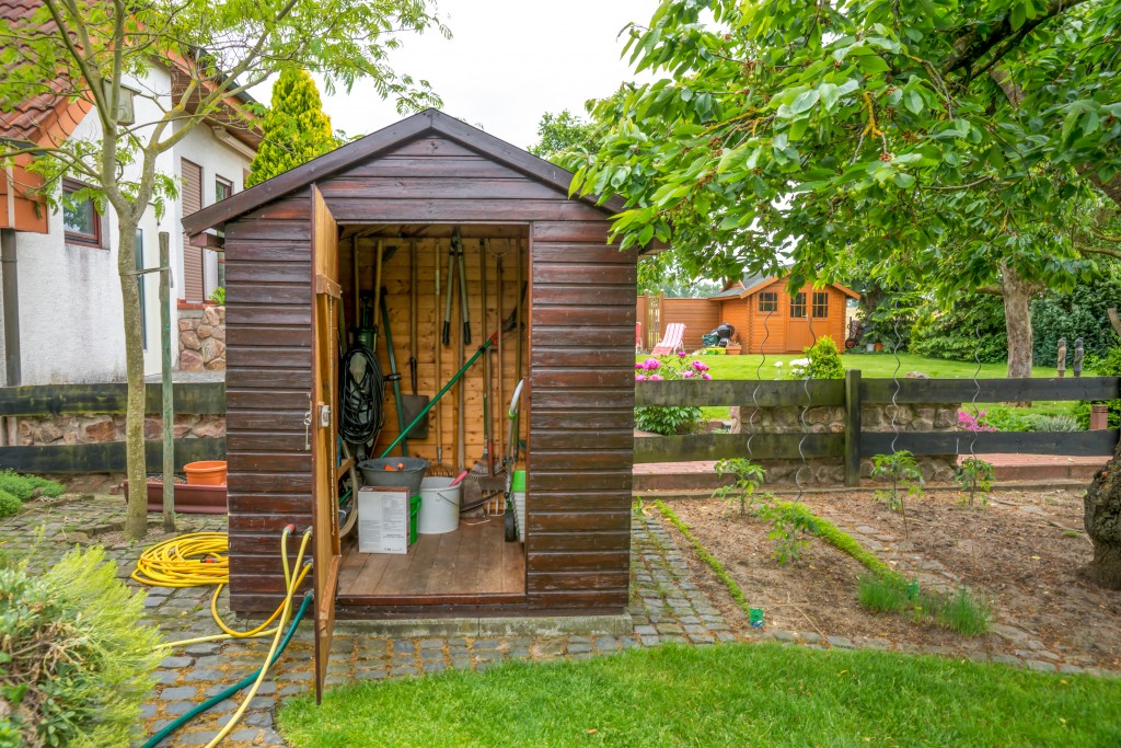 garden shed with tools and materials stored