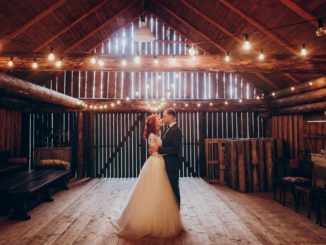 groom and bride in a barn wedding