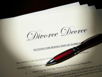 divorce papers with sign pen