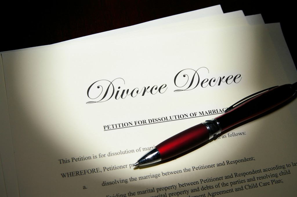 divorce papers with sign pen