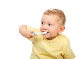 kid brushing teeth