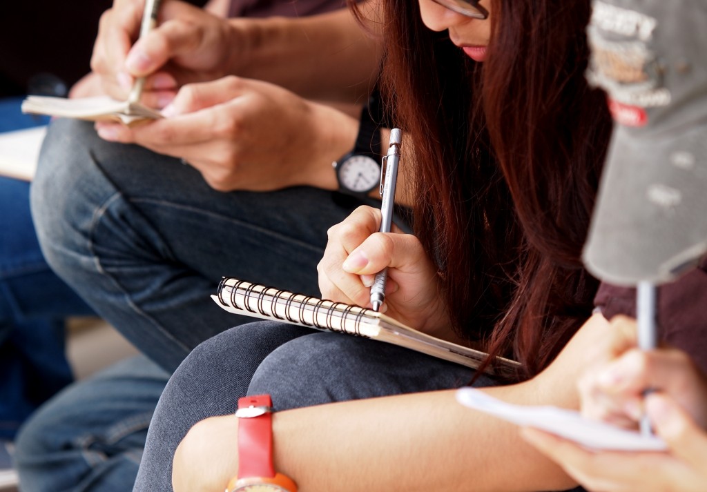 students taking notes in class