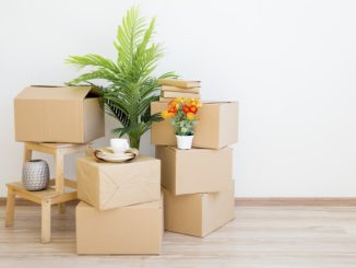 pile of boxes on the wooden floor