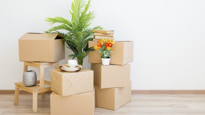 pile of boxes on the wooden floor