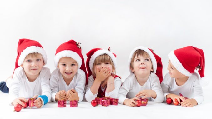 kids wearing santa hats