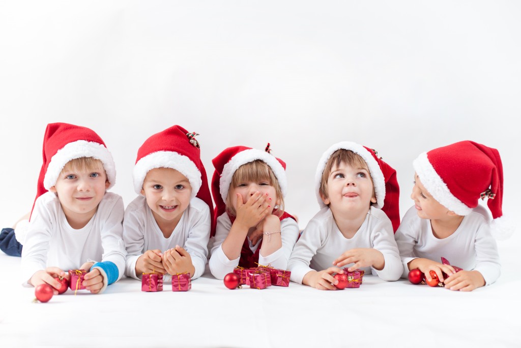 kids wearing santa hats