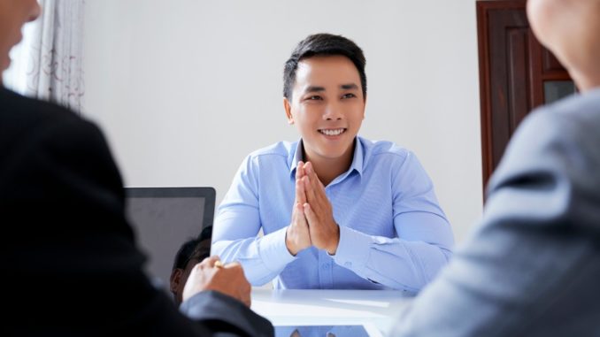 Man being interviewed for work