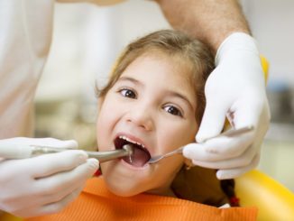 kid at the dentist