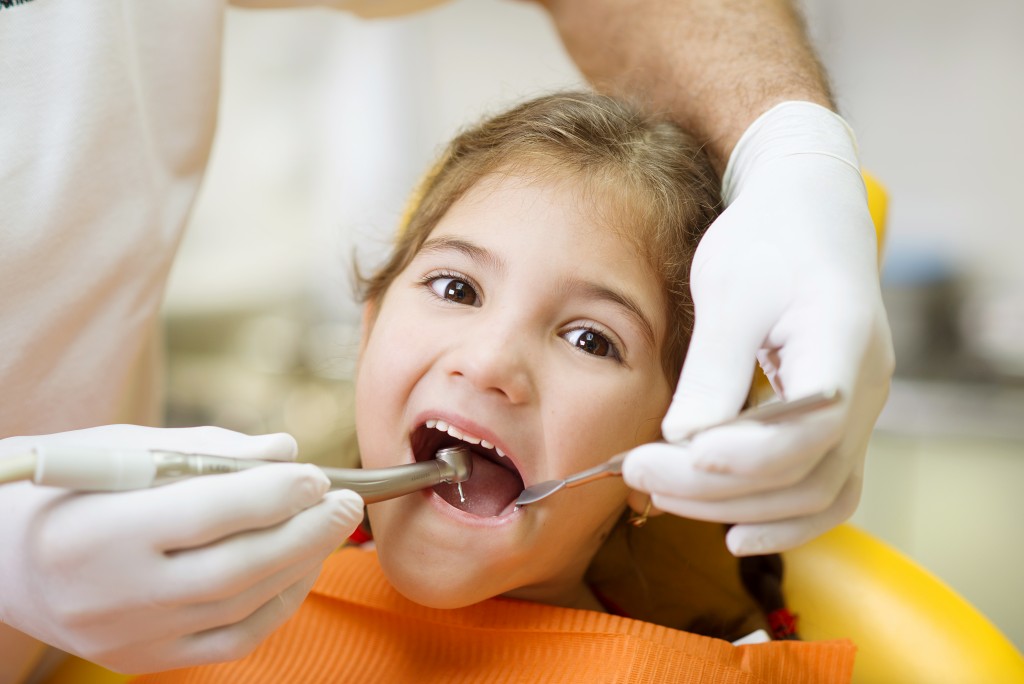 kid at the dentist