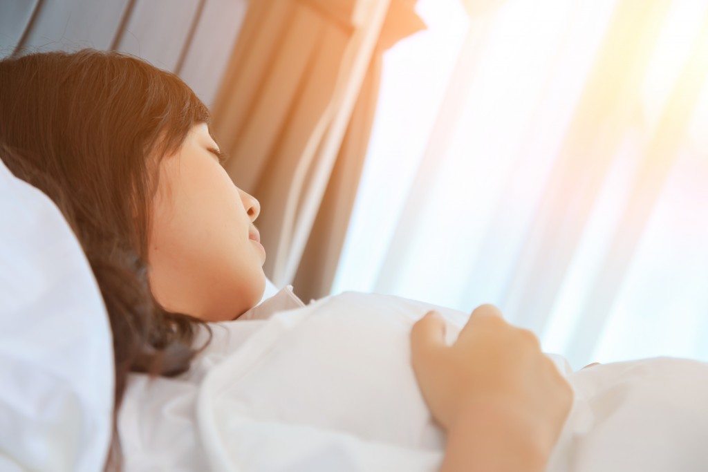 woman sleeping on a sunny day