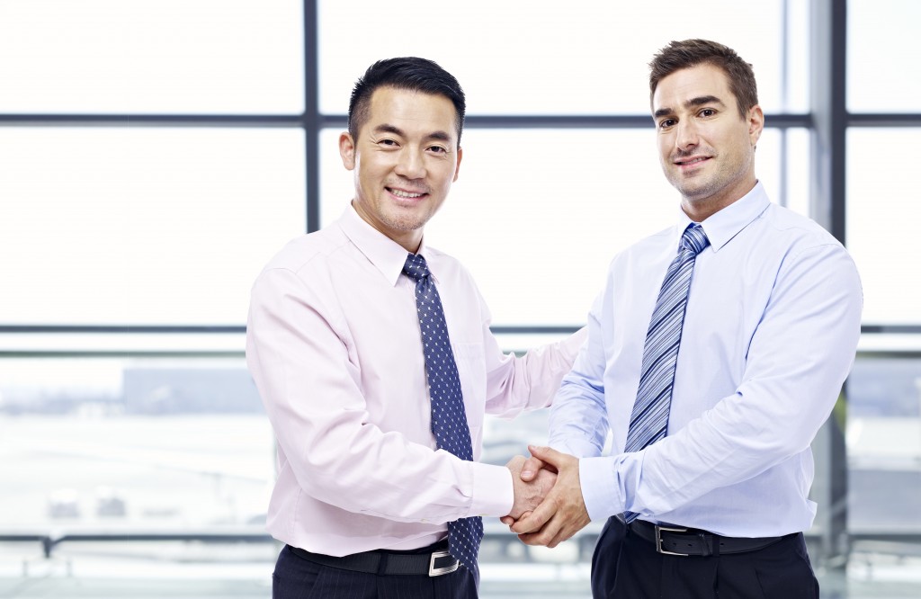 two business men shaking hands