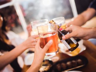 friends drinking beer together