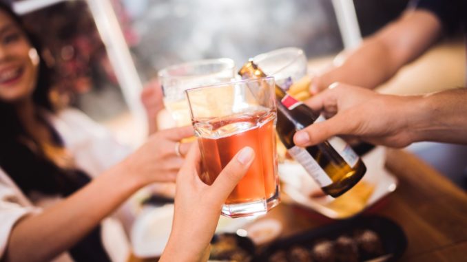 friends drinking beer together