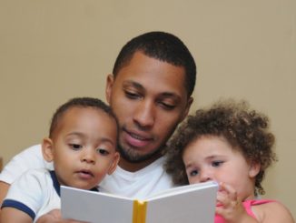 dad reading to his kids