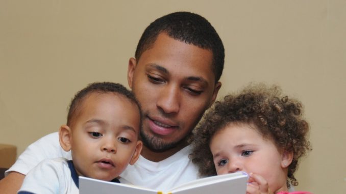 dad reading to his kids