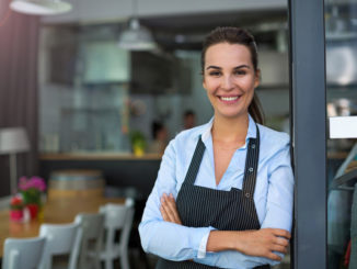 woman server in front of restaurant