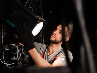 a person setting up a head light