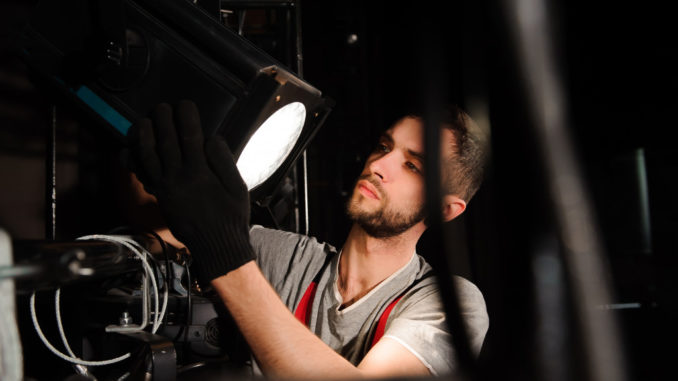 a person setting up a head light