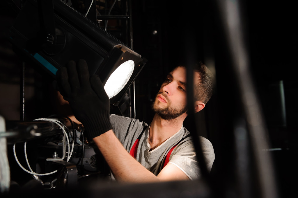 a person setting up a head light