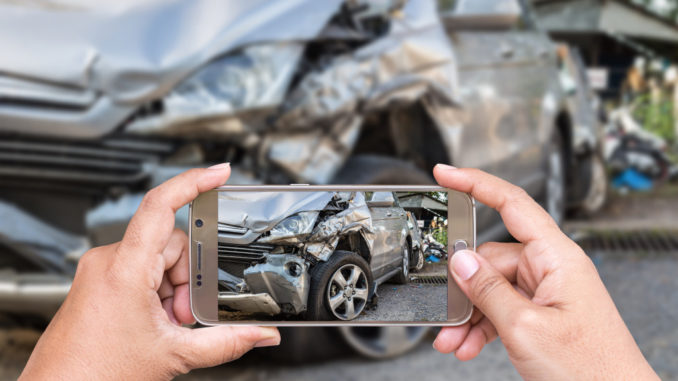 taking photo of accident
