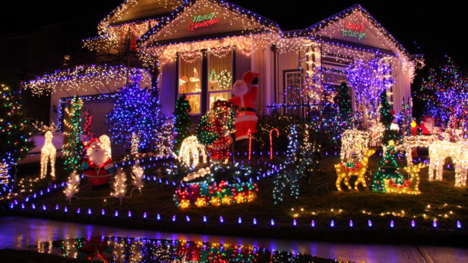house decorated with Christmas lights all over i
